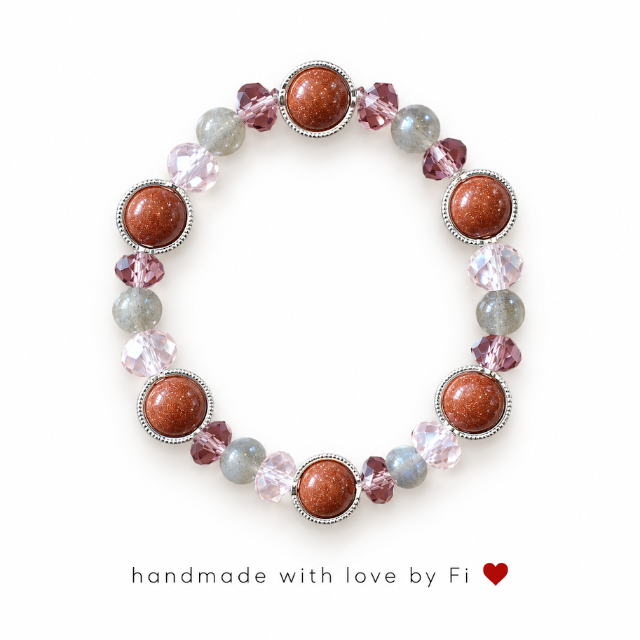 Handmade goldstone and pink crystal bead stretch bracelet with silver settings