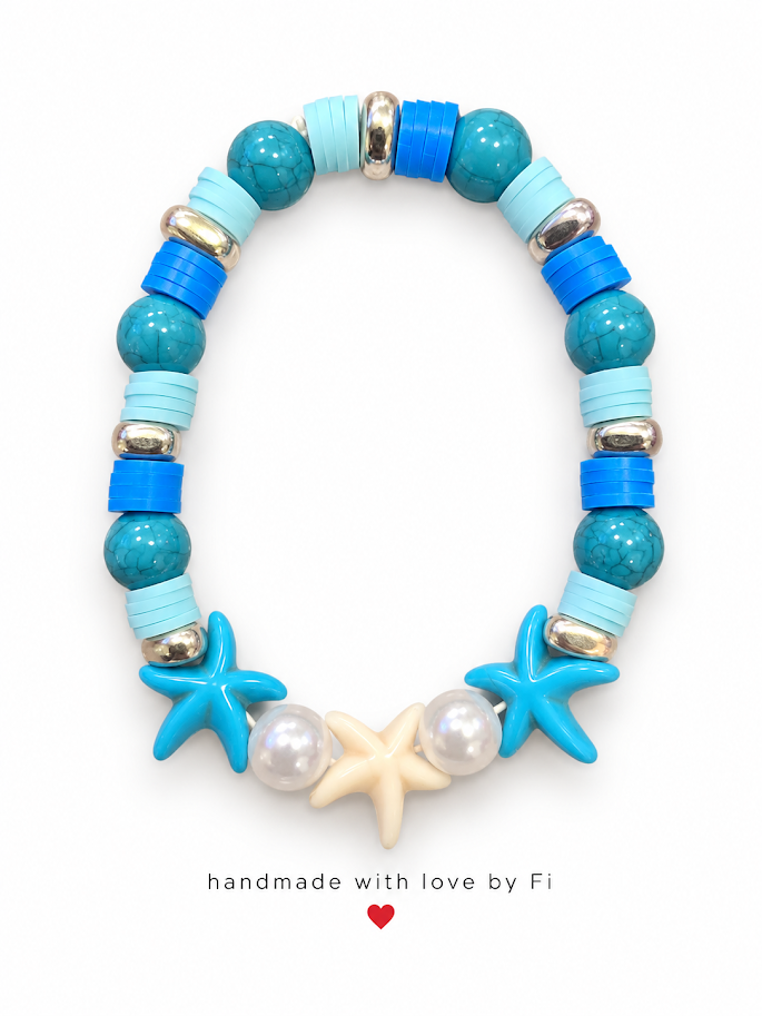 Handmade turquoise and blue bracelet with pearl-look beads and three starfish charms