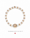 White cat's eye and champagne crystal bracelet with large faceted focal bead in ornate silver filigree handmade by Fi