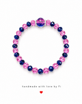 Hot pink and navy blue acrylic crystal bracelet with large blue globe focal bead and silver diamanté spacers handmade by Fi