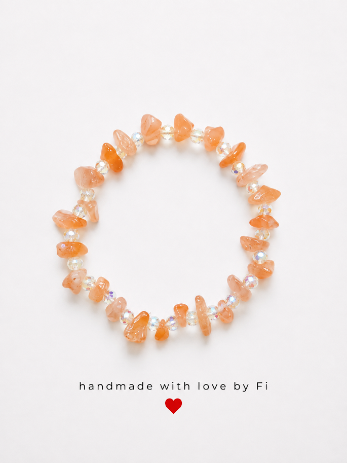 Peach carnelian chip bracelet with iridescent AB crystal rondelle spacers handmade by Fi