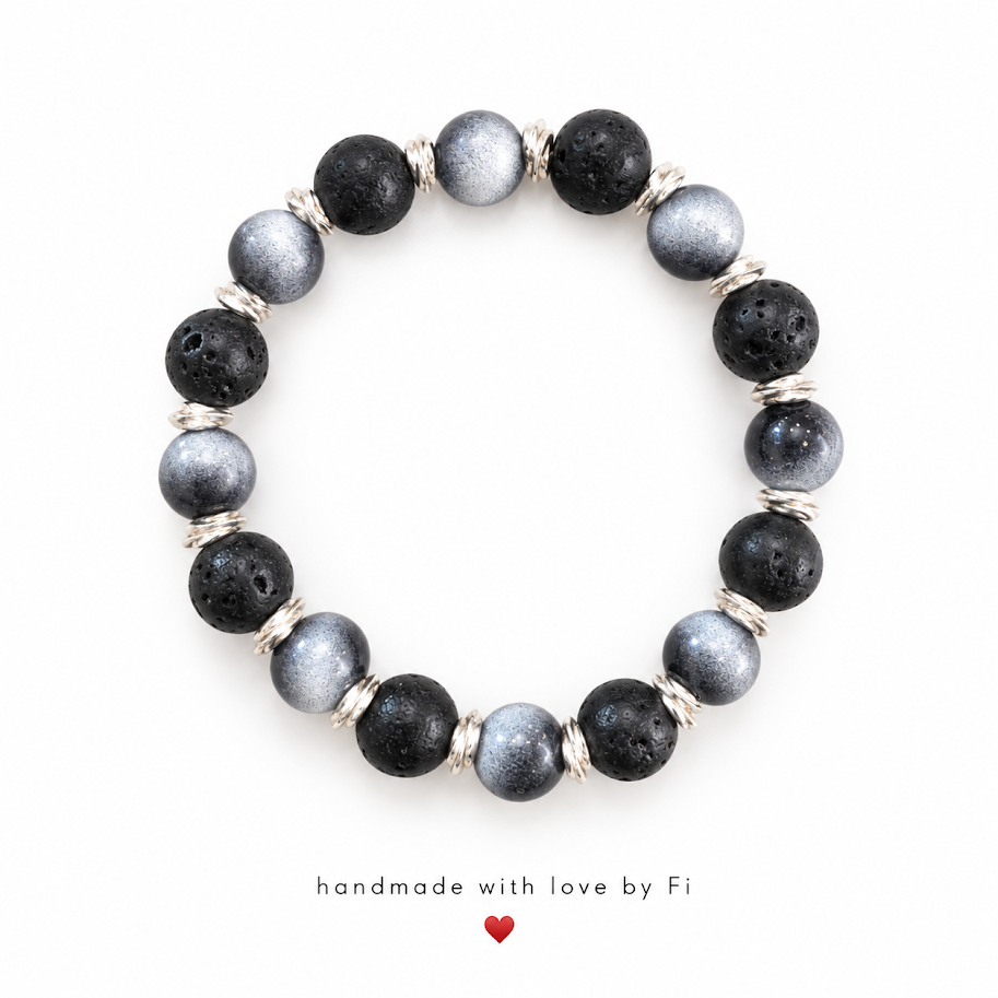 Black textured and shimmering slate-grey beaded bracelet with twisted silver-tone spacers