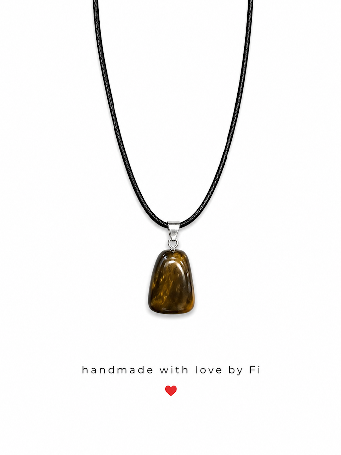 Tiger's eye tumbled freeform pendant necklace on black wax cord with silver bail handmade by Fi