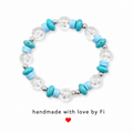 Star etched clear round and turquoise disc bracelet with pale blue heishi and silver spacers handmade by Fi
