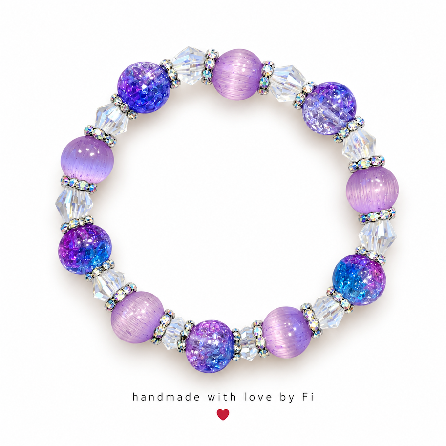 Lavender bracelet with purple-blue sparkle beads, clear facets and iridescent spacers