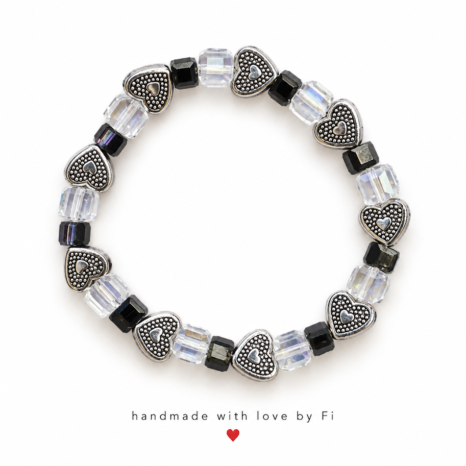 Silver-tone heart bracelet with black and clear faceted cube beads