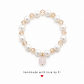 Pearl and champagne crystal bracelet with pale pink rose quartz drop pendant and gold bail handmade by Fi