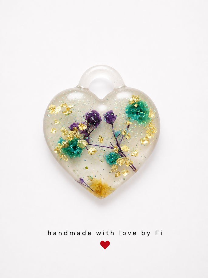 Purple and teal botanical resin heart pendant with yellow flower gold leaf and silver glitter handmade by Fi