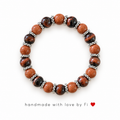 Handmade goldstone and red tiger's eye gemstone bracelet with silver spacers