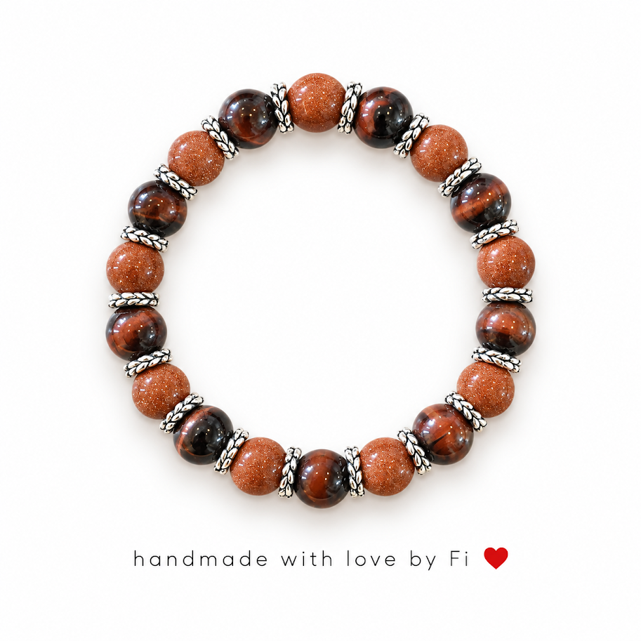 Handmade goldstone and red tiger's eye gemstone bracelet with silver spacers