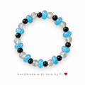 Handmade turquoise, black and clear crystal bead stretch bracelet