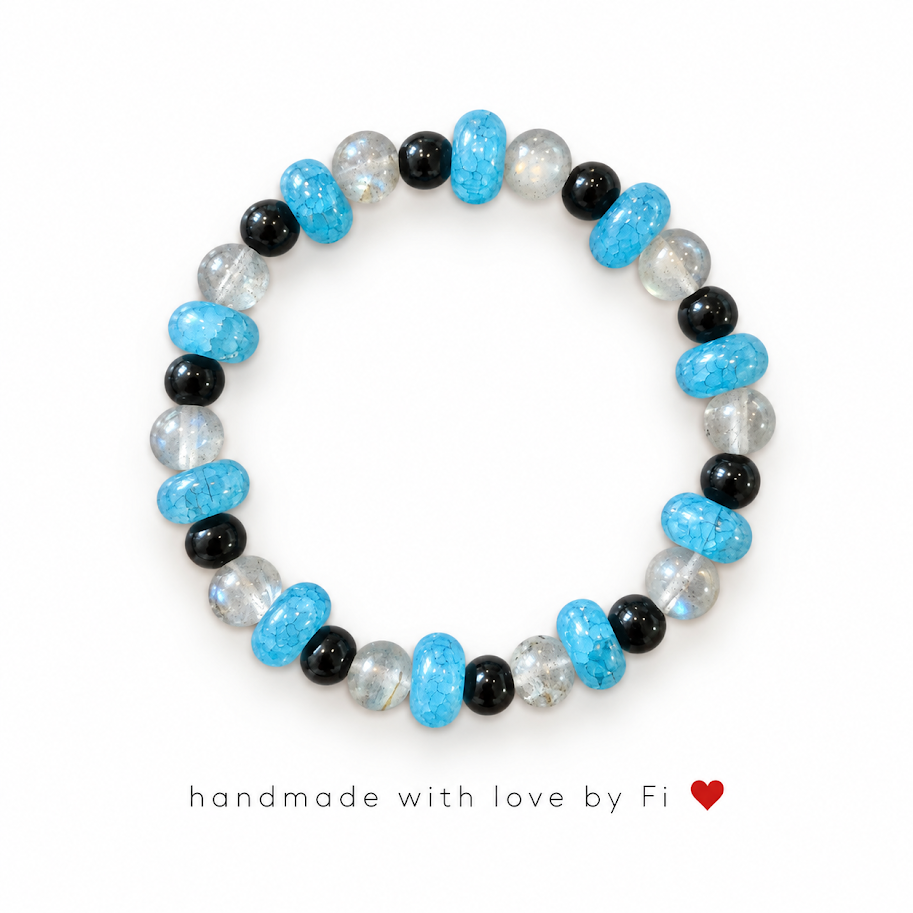 Handmade turquoise, black and clear crystal bead stretch bracelet