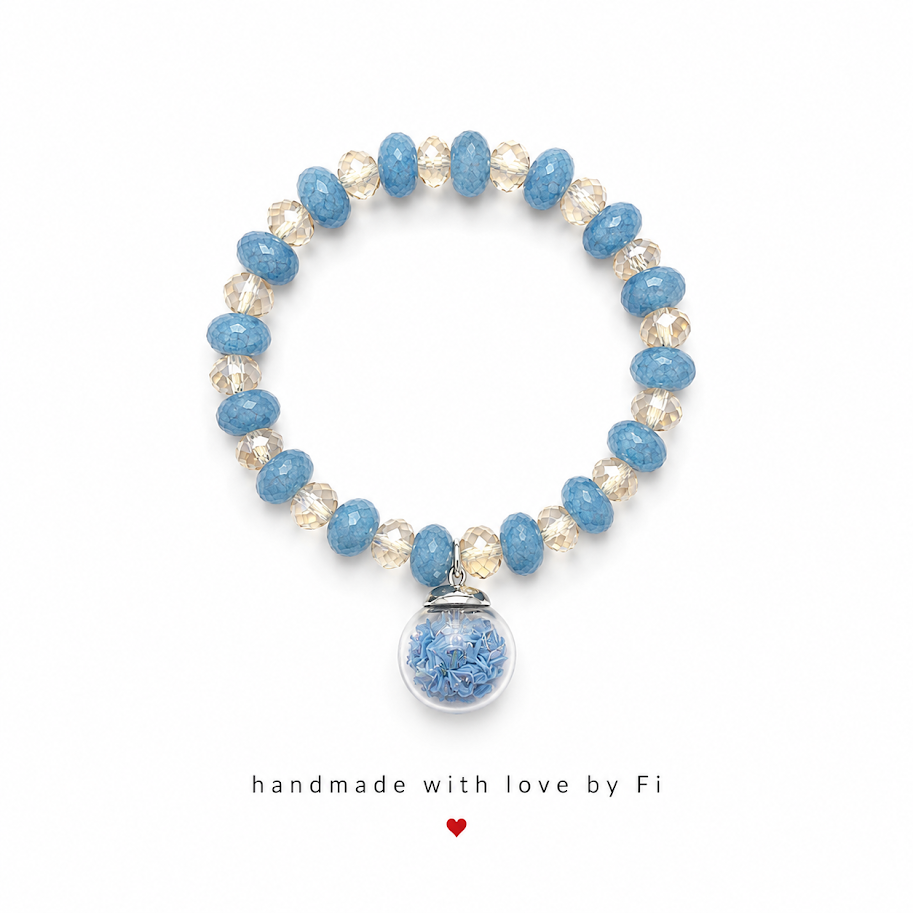 Cornflower blue and champagne crystal rondelle bracelet with glass globe dried flower charm handmade by Fi