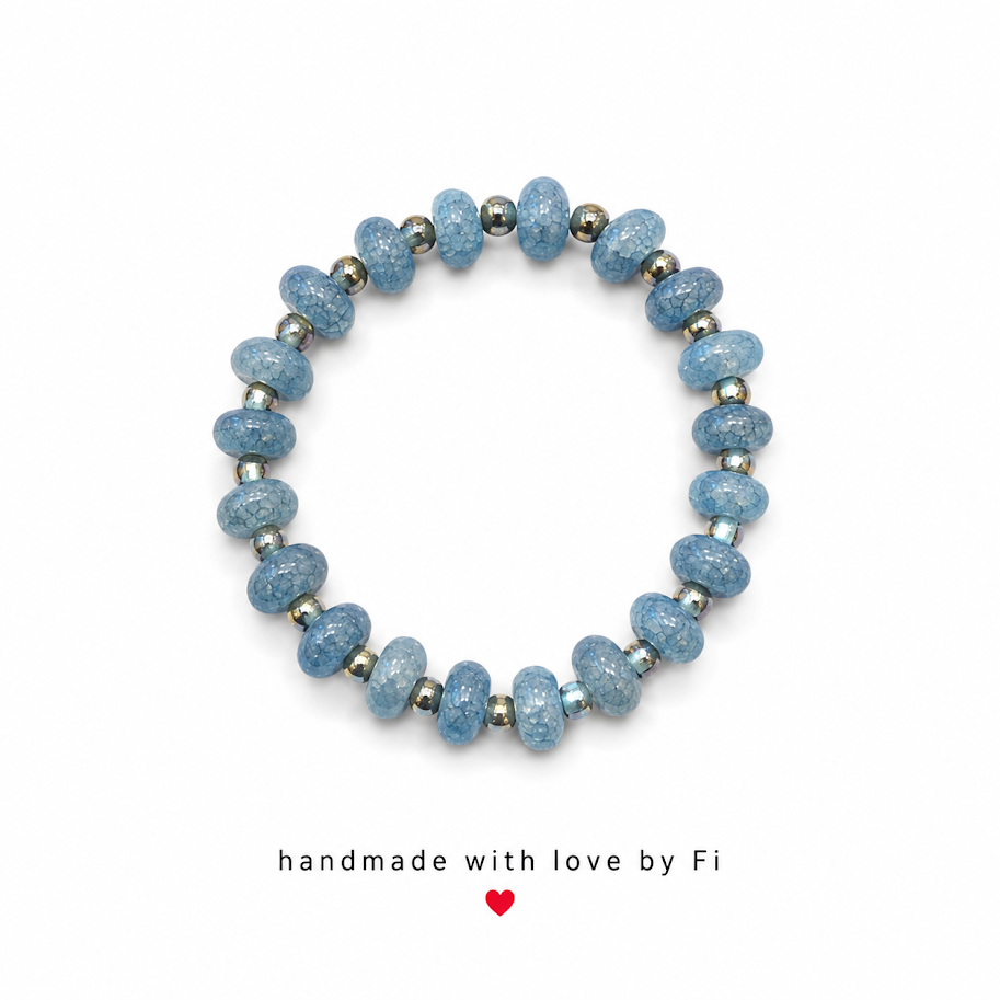 Powder blue crackle rondelle and silver hematite bracelet handmade by Fi