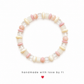Mother of pearl and rhodonite bracelet with peach moonstone and clear crystal cube beads handmade by Fi
