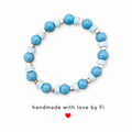 Turquoise crackle and pale blue heishi disc bracelet with silver cube spacers handmade by Fi