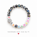Handmade F*ck Cancer bracelet with galaxy crackle glass beads and rainbow letter beads with rhinestone charm