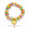 Pink, green and yellow chip bead bracelet with a clear dangling charm