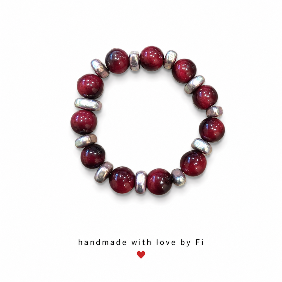 Burgundy red cat's eye and silver hematite disc bracelet handmade by Fi