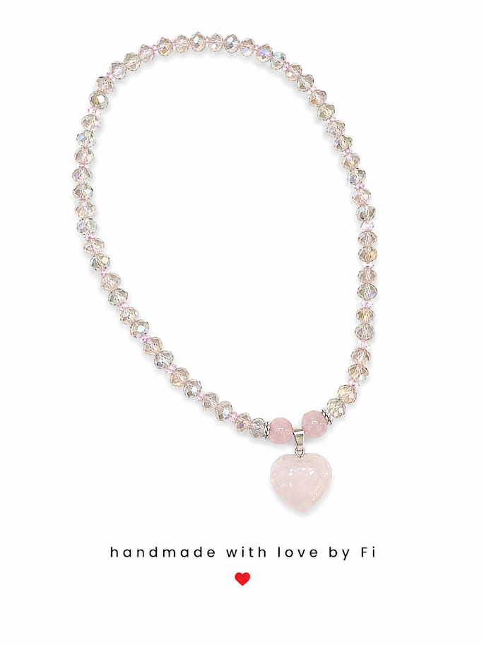 Rose quartz heart pendant necklace on iridescent crystal bead strand handmade by Fi