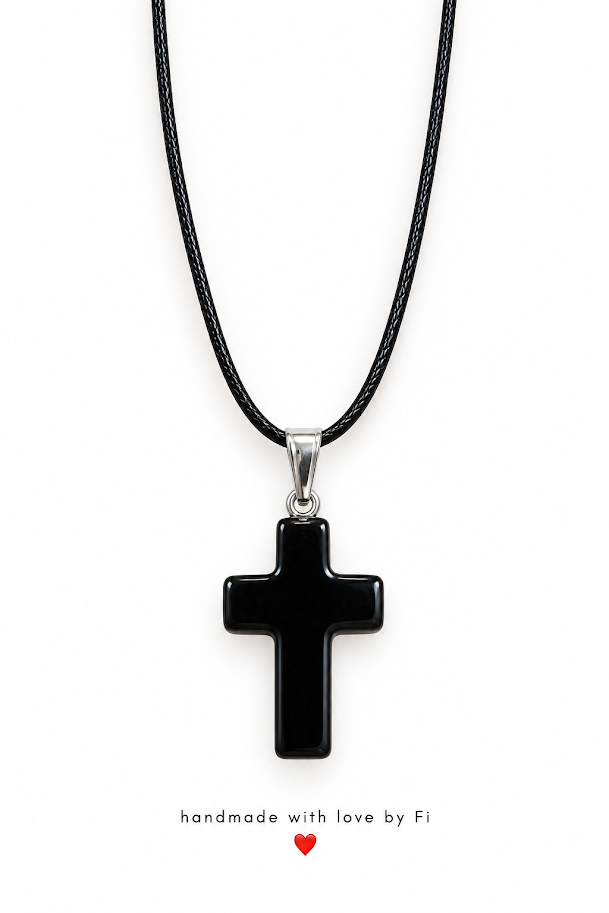Black cross pendant necklace on a black multi-strand cord with a silver-tone bail