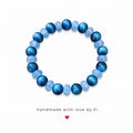Blue tiger eye and periwinkle crackle rondelle bracelet handmade by Fi