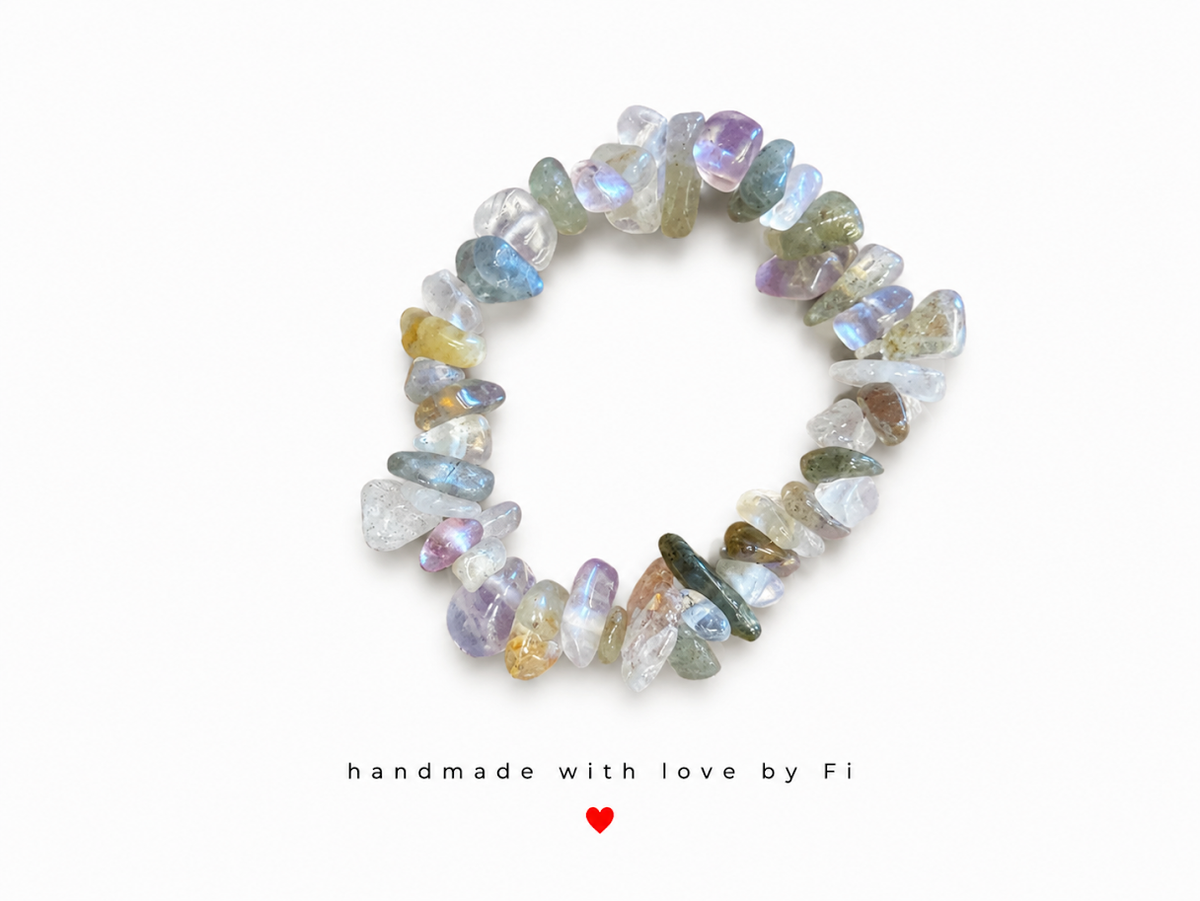 Iridescent mixed crystal chip bracelet in lavender blue sage green and golden yellow handmade by Fi