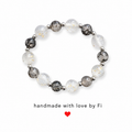 Frosted white and charcoal crackle bead bracelet with gold leaf shimmer and silver spacers handmade by Fi