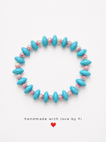 Turquoise disc and pink floral painted bead bracelet handmade by Fi